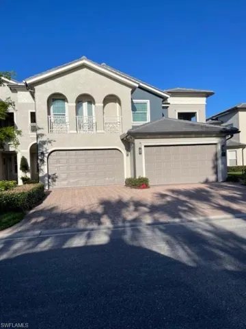 View of front of property featuring large 2 car garage.