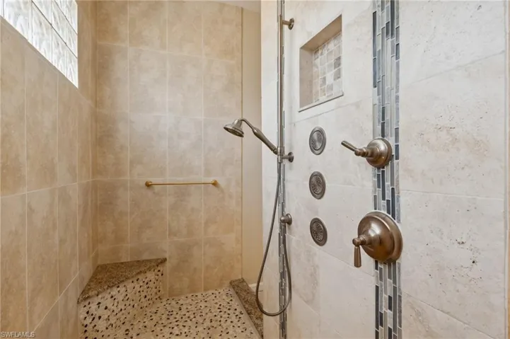 Bathroom with a tile shower