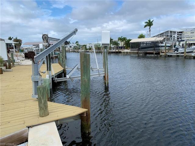 View looking west down canal to open water.