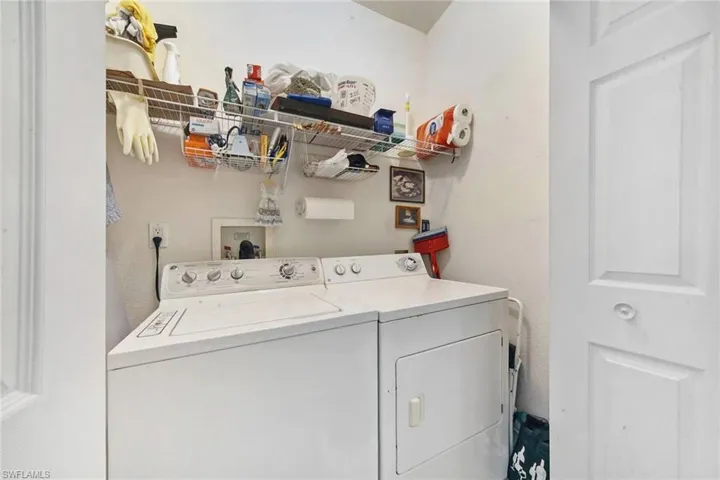 Laundry area featuring washer and clothes dryer