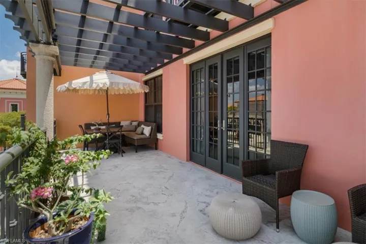 View of patio with a pergola, an outdoor living space, and french doors