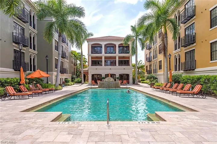 View of swimming pool featuring a patio area and pool water feature