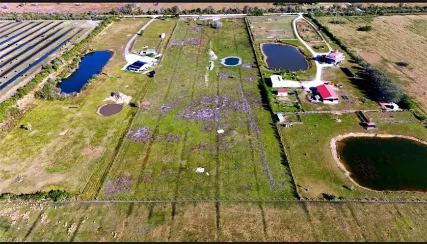 Drone / aerial view featuring a rural view and a water view