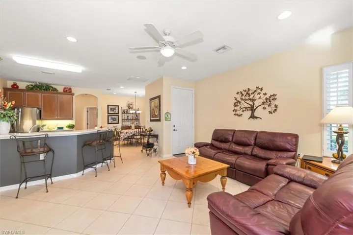 Open concept living room overlooks kitchen!