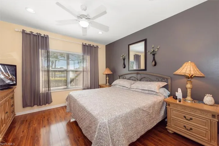 Spacious main bedroom with upgraded flooring!