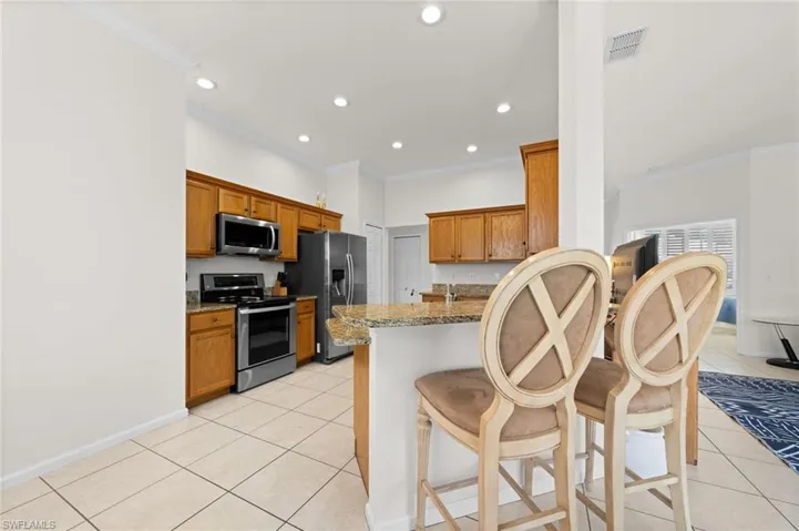 6450  Birchwood  CT, Naples, FL 34109