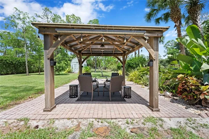 View of patio / terrace with a gazebo and a storage unit