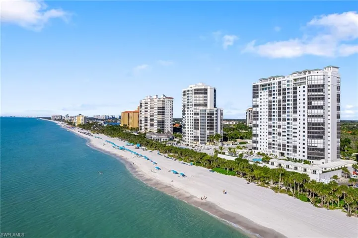 Aerial view with a beach view and a water view