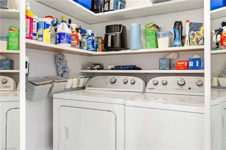 Laundry area featuring independent washer and dryer