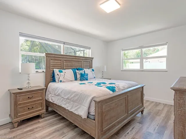 Bedroom featuring baseboards and light wood-style flooring