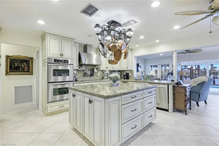 Immense center island is ideal for the cook in the family and provides extra storage.