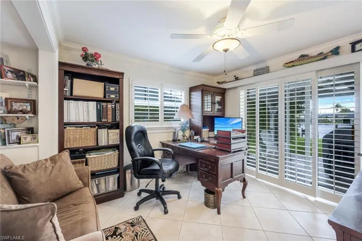 Third bedroom with its private patio and water view is currently being used as an office.