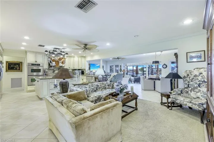 You'll appreciate the attention to detail throughout this lovely home. Custom woodwork and specialty milled trim, 5" baseboard; crown molding; plantation shutters.