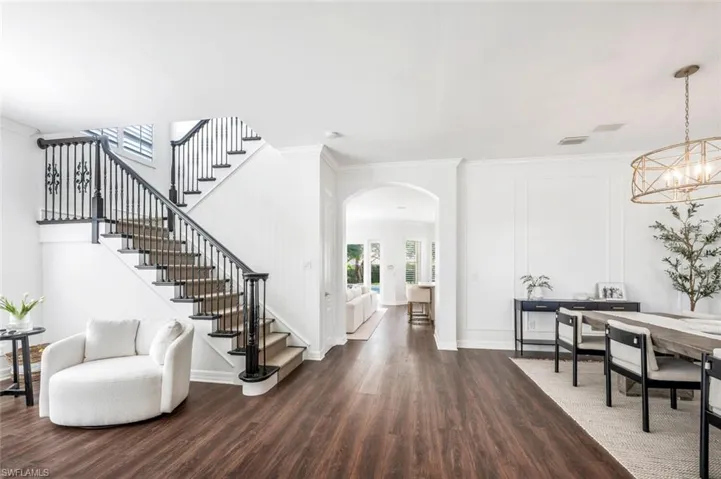 Foyer entrance featuring hardwood /