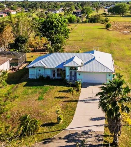 Aerial view of property and surrounding area