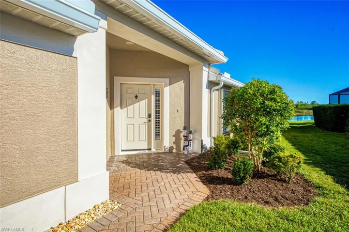 Entrance to property with a yard