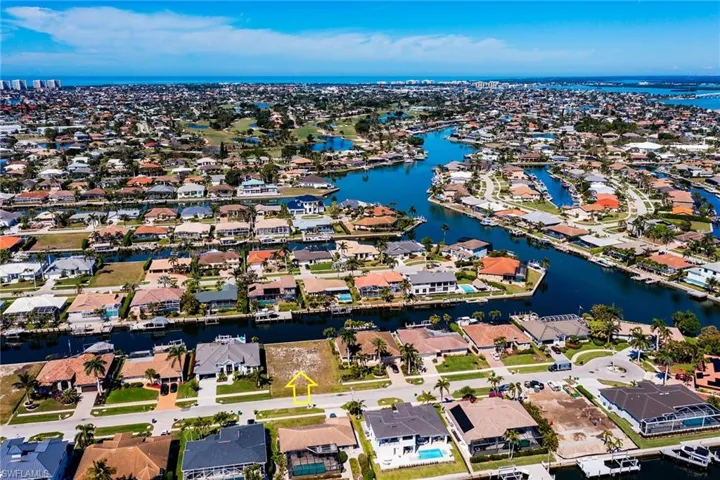Bird's eye view featuring a water view and a residential view