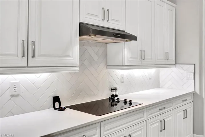 Upgraded Tile Backsplash and Quartz Counters