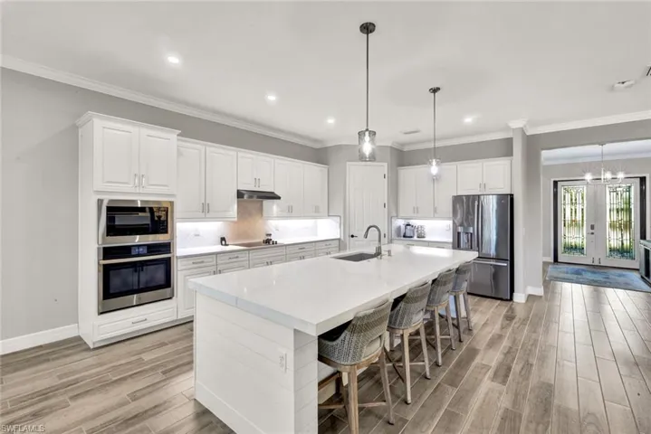 Double Wall Appliance Package, Custom Cabinet Color and Upgraded Backsplash