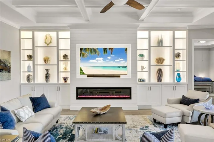 Custom Entertainment Wall with LED Lighting and a 75' Linear Multicolor Fireplace
