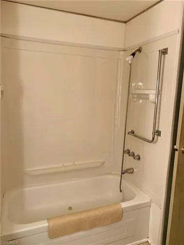 Bathroom with shower / bathtub combination
