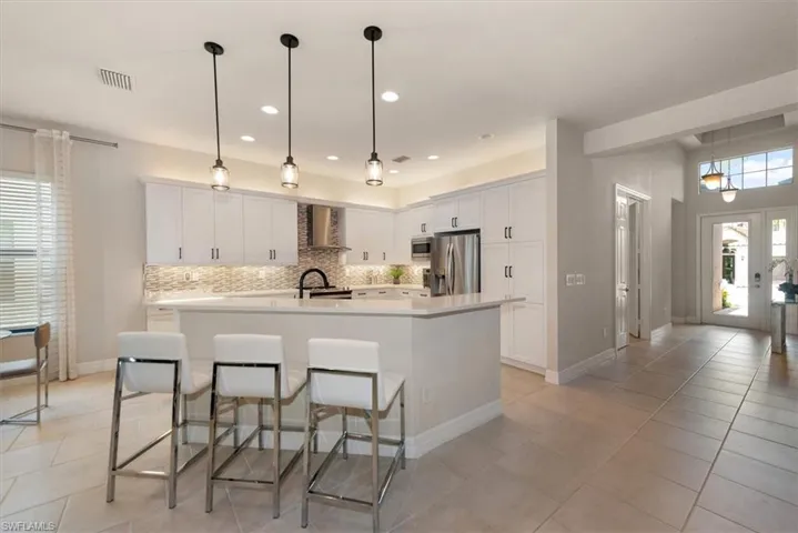 Bathroom featuring shower / bathtub combination and vanity