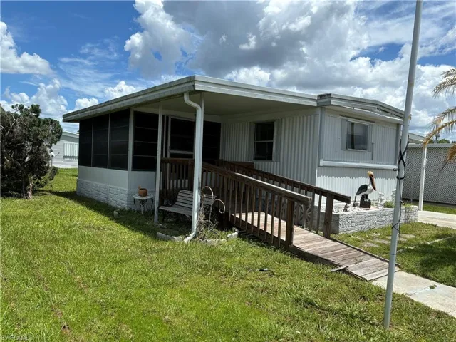 Wheelchair ramp and screened lanai