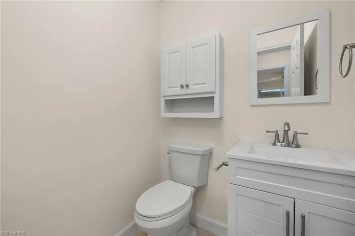 Bathroom featuring toilet and vanity