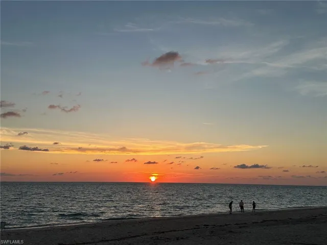 View of water feature featuring a beach view