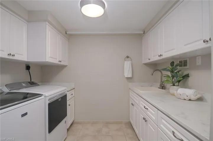 Spacious laundry with sink