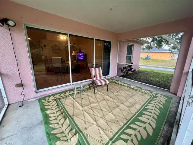 View of screened lanai overlooking the backyard.