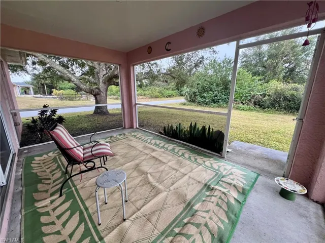 View of screened lanai overlooking the backyard.