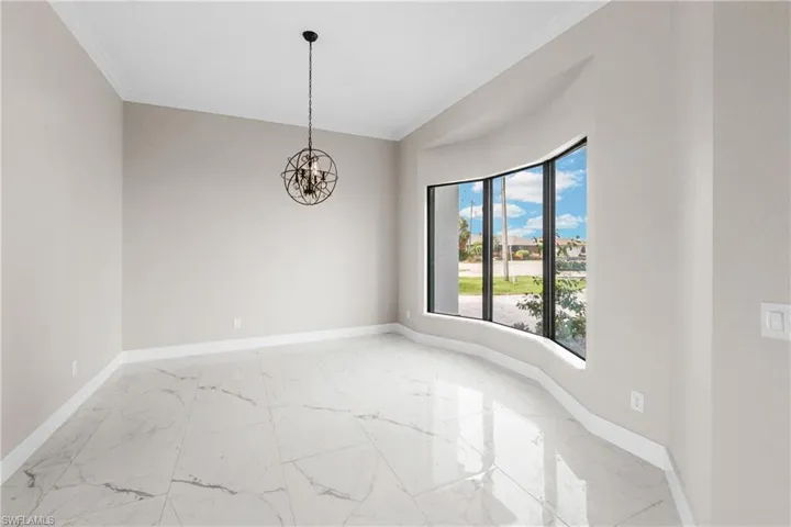 This is separate from dining area, this is a formal dining or sitting area at the front of the home