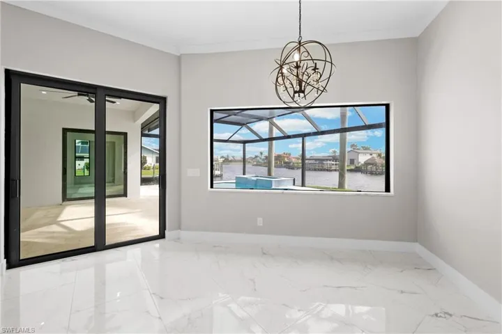 This dining area is off the kitchen and big enough for full dining table