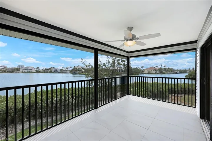 Enclosed Eastern Facing Lanai with Open Bay Views! Watch the Dolphin and Manatees swim by!