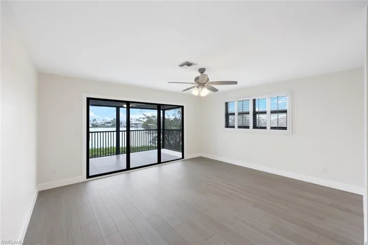 Sliders Leading to your Screened In Lanai and Gorgeous Bay Views!