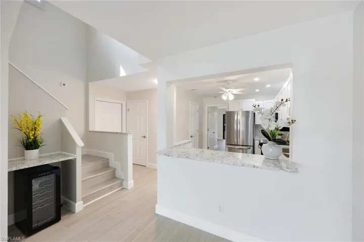 The Left White Door is the Main Level Front Door and the Right Door is the Access to the Garage!