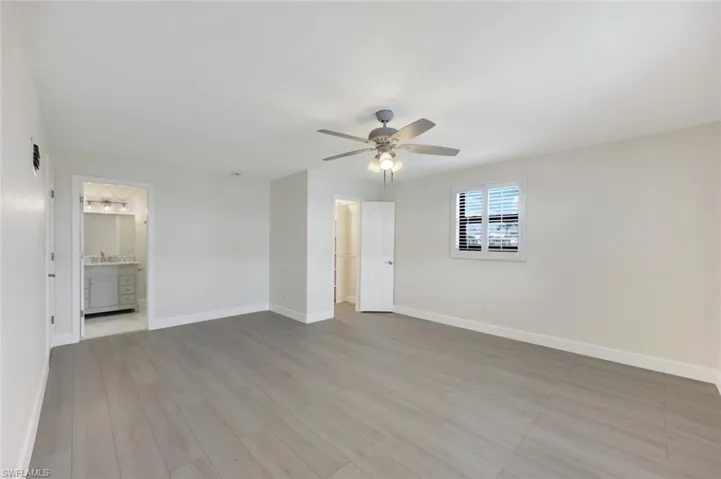 Third Floor Primary Bedroom with En-Suite Bathroom and Custom Walk-In Closet!