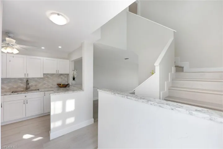 Stairs leading to your Primary Bedroom and En-suite Bathroom!
