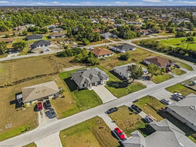 View of property location with nearby suburban area