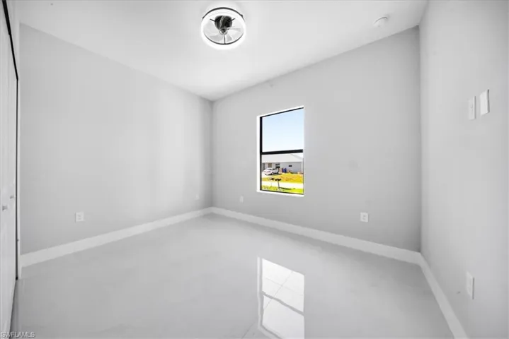 Empty room with baseboards