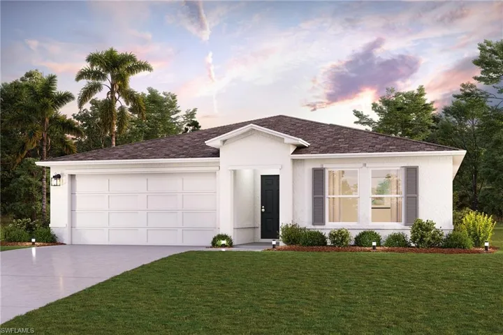 View of front of property with a garage and a lawn