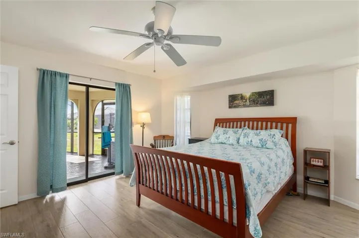 Primary Bedroom has view of pool