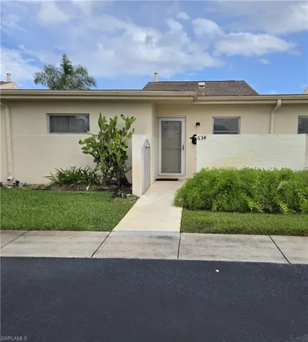 Front entrance with assigned parking space right outside your door.