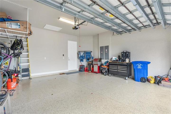 2 car garage with storage and Epoxy floors.  Generator  Plug and  Surge Protection.