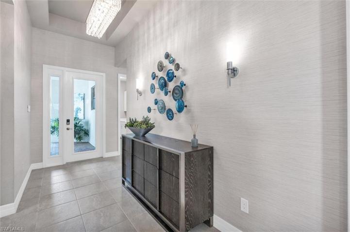 12 foot Tray Ceiling, Wallpaper and Upgraded lighting fixtures and wall sconses
