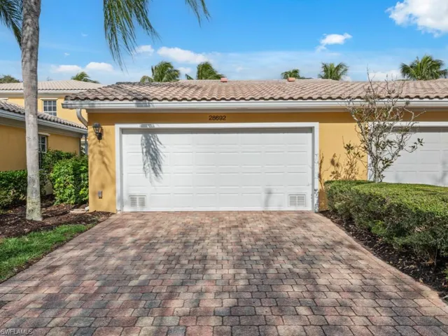 2 Car Garage & 2 Parking Spaces