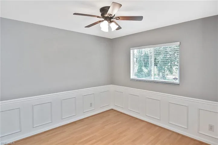 Spare room featuring light hardwood / wood-style flooring and ceiling fan