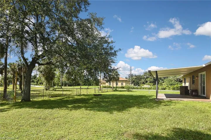 View of yard with a patio area