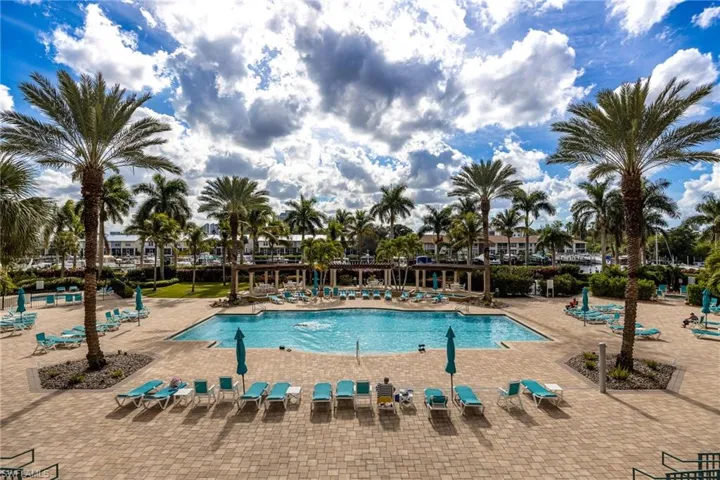 Community pool with a patio area